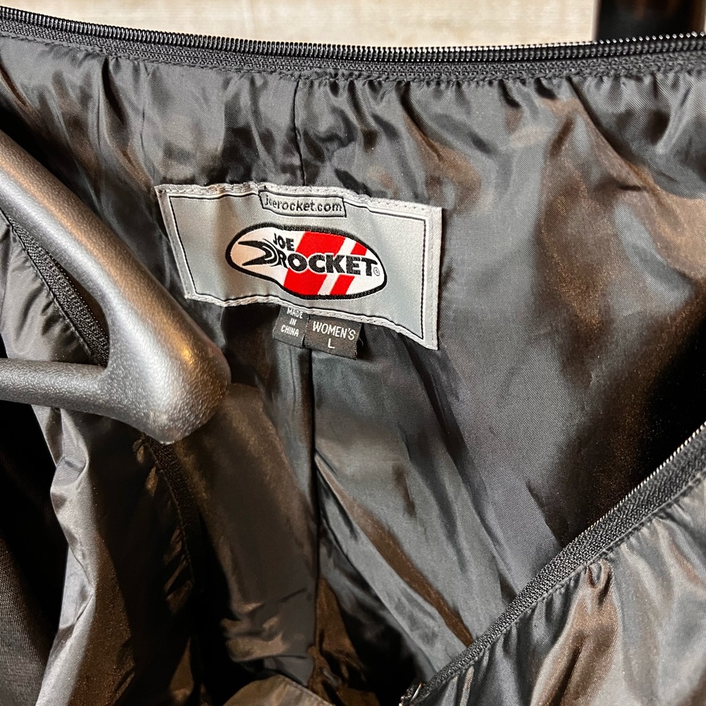Joe Rocket motorcycle jacket, motorcycle pants, and pull on rain pants